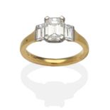 An 18 Carat Gold Diamond Solitaire Ring, an octagonal cut diamond in a white claw setting between