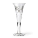 An Ale Glass of Large Proportions, mid 18th century, the drawn trumpet bowl engraved with hops and