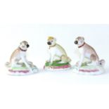 A Pair of Derby Porcelain Figures of Pugs, circa 1780, sitting on scroll moulded mound bases, 7.