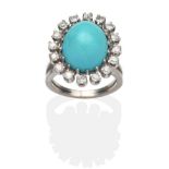 A Turquoise and Diamond Cluster Ring, an oval cabochon turquoise within a border of old cut diamonds