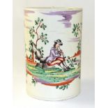 A Creamware Mug, circa 1770, of cylindrical form with entwined strap handle, painted in colours with