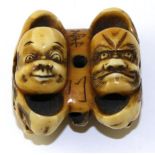 A Japanese Ivory Netsuke, Meiji period, as a group of Noh masks, signed, 4.5cm; and A Small Okimono,