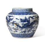 A Chinese Porcelain ''Dragon'' Jar, of ovoid form with short cylindrical neck, painted in underglaze