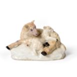 A Bow Porcelain Figure Group of Sheep, circa 1752, modelled as a recumbent sheep and lamb on a mound