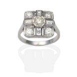 An Art Deco Style Diamond Cluster Ring, a round brilliant cut diamond in an octagonal white milgrain