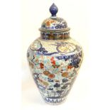 An Imari Porcelain Jar and Cover, circa 1700, typically painted with a fenced garden within