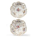 A Pair of Chelsea Porcelain Dishes, circa 1760, of shaped circular form, painted with sprays of