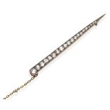 An Art Deco Diamond Bar Brooch, a tapered bar set with graduated old cut diamonds in white claw