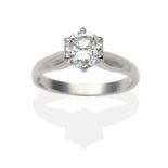 An 18 Carat White Gold Diamond Solitaire Ring, a round brilliant cut diamond in a claw setting to