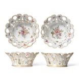 A Pair of Chelsea Porcelain Baskets, circa 1760, of circular form, painted with flowersprays