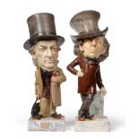 A Pair of Pottery Caricature Figures of Gladstone and Disraeli, late 19th century, both modelled