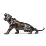 A Japanese Bronze Tiger, Meiji period, naturalistically modelled crouching, seal marks, 36cm long