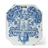 A London Delft Pill Slab, circa 1740, of canted rectangular form painted in blue with the arms of