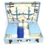 A 1950s Brexton Picnic Set, model no.7908, with a blue case containing original plastic food boxes