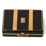 An Art Deco Black Enamelled and Gold Plated Lady Motorists Travelling Powder Compact circa 1920