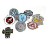 Eight Chrome Plated Car Badges, to include a Wagbi red enamel badge, a Wildfowl Trust blue enamel