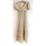 Early 19th Century Cream Gauze Evening Gown, with three rows of applied padded trim to match a