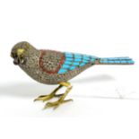 A 20th century silver and gilt life sized bird ornament set with turquoise and coral stones