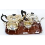 A three piece silver tea set, Birmingham, 1945 together with a separate silver teapot