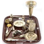 A small group of silver including a ring tree, knife rest, a bud vase, communion dish etc