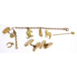 A charm bracelet, three loose charms, a stick pin and a pair of cufflinks Charm bracelet - 5.19g