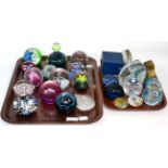 A small collection of paperweights including Caithness, Mdina, Millefiori, etc (two trays)