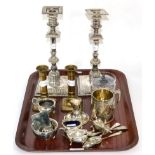 A pair of 19th century silver-plated candlesticks, a pair of 19th century brass candlesticks, a