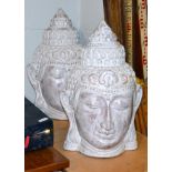 A pair of terracotta Buddha heads