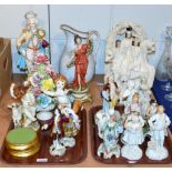 A group of porcelain, pottery and bisque figures including 19th century Staffordshire and 20th