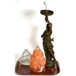 A patinated Neo-Classical cast figural lamp with shade and a Pukeberg paperweight (2)