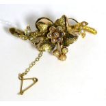 A seed pearl textured floral brooch, stamped '585'7.4g gross