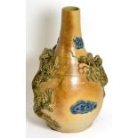 A stoneware vase decorated with two Chinese dragons
