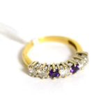 An 18ct gold diamond and amethyst half hoop ring