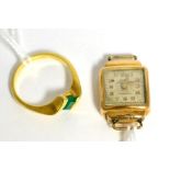 A lady's wristwatch with case stamped '18K' and a lady's emerald set ring stamped '750'