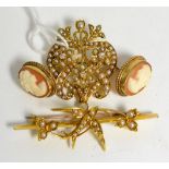 A seed pearl and diamond set floral brooch; with a bar brooch and a pair of cameo earrings (4)