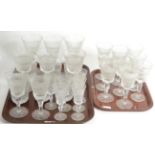 A Royal Doulton part suite of drinking glasses (on two trays)