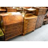 An oak linen fold carved tallboy, a reproduction four height bow fronted chest of drawers and a