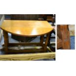 An Old Mill 'Knightman' drop leaf coffee table