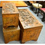 A set of three carved oriental camphor chests (feet for chests located in each chest)