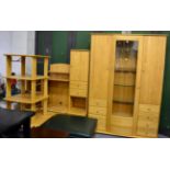 A modern Hulsta die Mobelmarke ash three piece sectional wall unit together with a tall cabinet, the