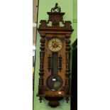 A Vienna walnut cased regulator type clock