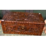 A carved camphor wood trunk