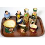 A collection of Royal Doulton figures including 'Pickwick', 'Fat Boy', 'Winston Churchill', 'Capt