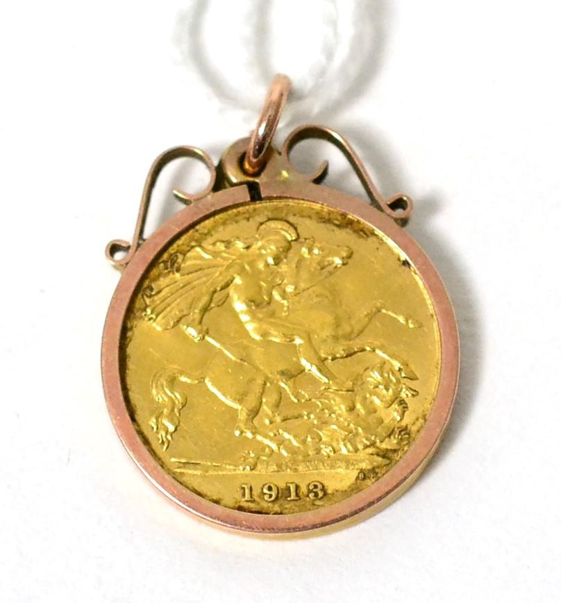 A 1913 half sovereign loose mount as a pendant5.6g