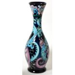 A Moorcroft pottery Amphisbaena pattern vase by Trevor Critchlow, numbered 56/100, dated 2006, 37c