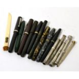 A collection of fountain pens and silver and plated propelling pen/pencils, including examples