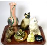 A Moorcroft Orchid pattern pin dish; a Beswick cat; model 1867; a Winstanley cat; a Border Fine