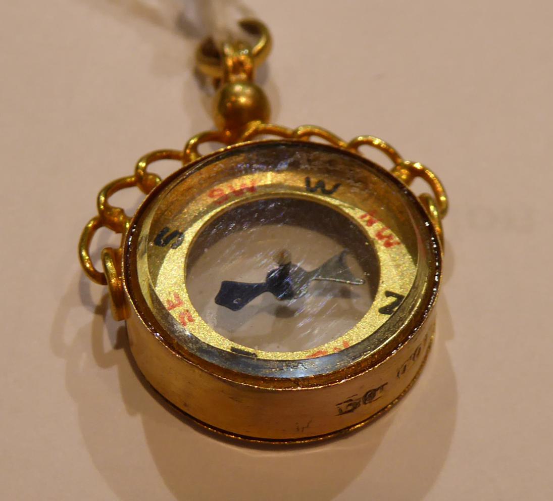 A compass fob, in a full hunter case, stamped '18' and a compass fob charm, stamped '18CT' (2) - Image 2 of 5