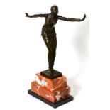 A reproduction bronzed figure of a dancer, after Chiparus