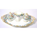 A porcelain inkstand with foliate and ribbon border